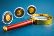 Coins and magnifier