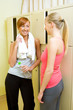 Two girls in locker room after training Two girls in locker room after training
