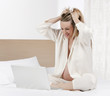 Pregnant woman working on a laptop