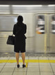 Foto: Woman waiting for the subway Woman waiting for the subway