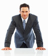 Satisfied young business man isolated against white
