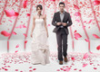 Wedding couple walking in roses