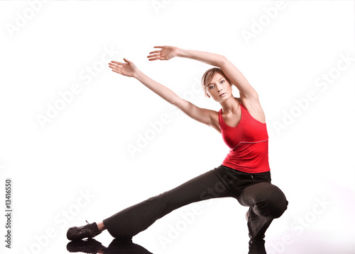 Photo: Young woman doing fitness exercise Young woman doing fitness exercise