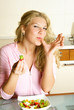 pretty woman eating a salad pretty woman eating a salad