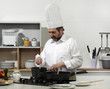 Cook in a kitchen, making a delicious dish Cook in a kitchen, making a delicious dish