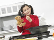 little girl in the kitchen with his bear little girl in the kitchen with his bear