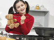 little girl in the kitchen with his bear little girl in the kitchen with his bear