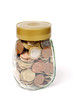 Bote de cristal con monedas