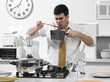 business man in the kitchen that it tastes what he cooked business man in the kitchen that it tastes what he cooked