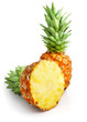 fresh pineapple fruit with cut and green leaves