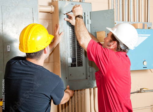 Photo: Electrician Teamwork Electrician Teamwork