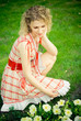 Beautiful young woman on green field in summer Beautiful young woman on green field in summer
