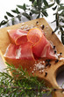 Sliced prosciutto with different herbs and seasoning Sliced prosciutto with different herbs and seasoning