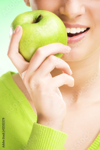 Photo: young beauty woman with apple young beauty woman with apple