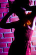 Night girl hold on the head in the dark