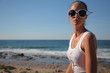 Young woman on the coastline