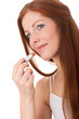 Body care series - Beautiful young woman applying lipstick