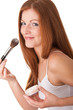 Body care series - Portrait of smiling woman applying powder