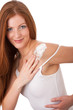 Body care series - Long red hair woman applying lotion