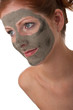 Body care series - Beautiful woman with mud mask