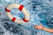 Hand reaching for Lifering Hand reaching for Lifering