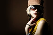 Fashion woman portrait wearing sunglasses on dark background Fashion woman portrait wearing sunglasses on dark background