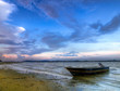 Photo: Beached Boat at Low Tide at Sunset Beached Boat at Low Tide at Sunset