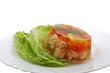 Aspic with meat carrot lemon and dill on the plate