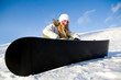 Photo: Girl with snowboard on snow Girl with snowboard on snow