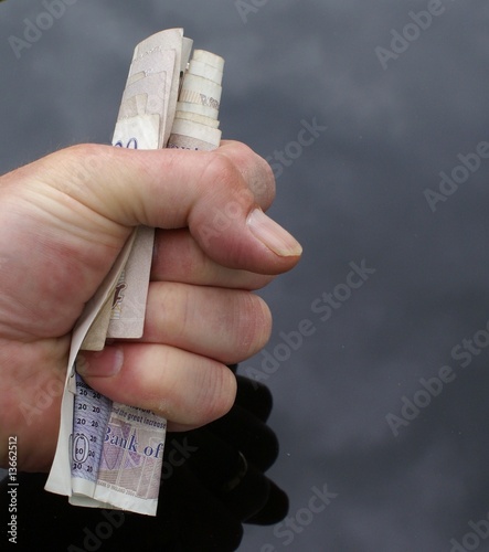 Photo: Money squeeze Money squeeze