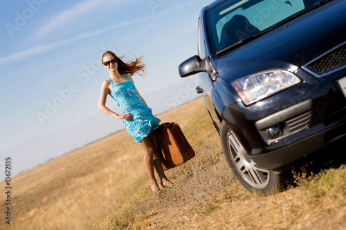 Photo: girl and suitcase girl and suitcase