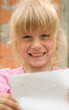 Child showing paper