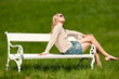 Blond young woman enjoying sun