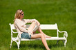 Attractive young woman reading book