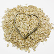 heart filled with oatmeal surrounded by oatmeal