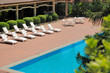 Swimming pool and deck chairs
