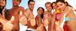 Teenagers showing thumbs up sign