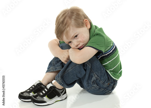 Photo: Young Boy Sad and in Trouble Young Boy Sad and in Trouble