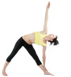 Young woman doing yoga exercise (Parivritta Trikonasana)