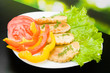 Plate with chebureks, salad, pepper and tomato Plate with chebureks, salad, pepper and tomato