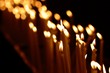 candles in row in dark church candles in row in dark church