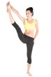 Young woman doing yoga exercise