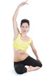 Young woman doing yoga exercise