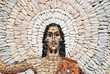 a fragment of a stone mosaic  of Jesus Christ resurrection
