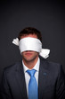 Businessman blindfolded