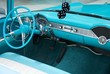 Interior shot of a blue colored 1956 convertible with fuzzy dice Interior shot of a blue colored 1956 convertible with fuzzy dice