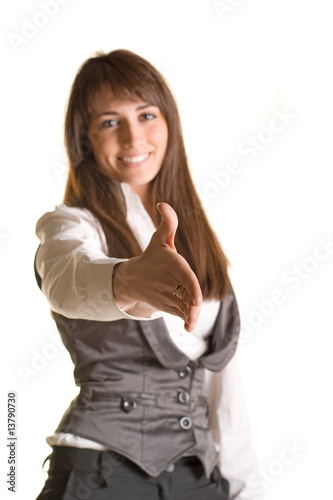 A business woman with an open hand ready to seal a deal