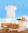Laundry day with towels, clothespins on table