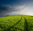 tracks cross cultivated hill at twilight tracks cross cultivated hill at twilight