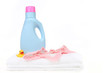 Baby Girl Laundry Items With Bottle of Detergent